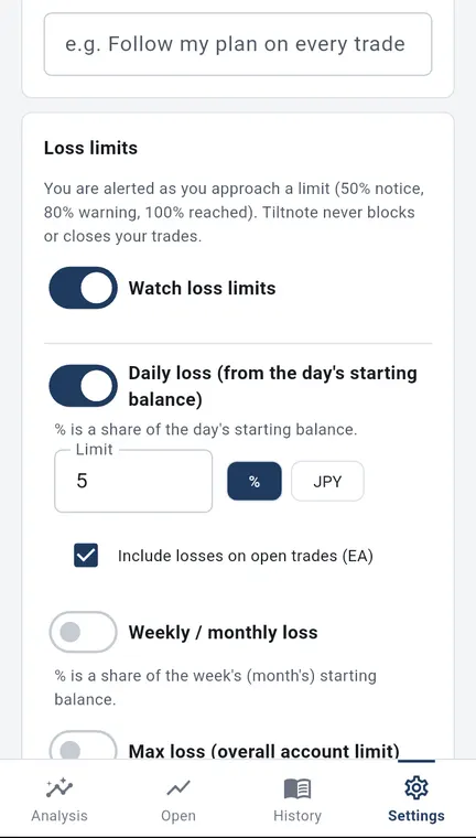 The loss limit part of Settings on Android: caution at 50%, warning at 80%, reached at 100%